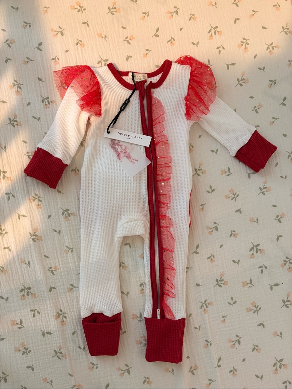White One-Piece Footie with Red Ruffle Trim